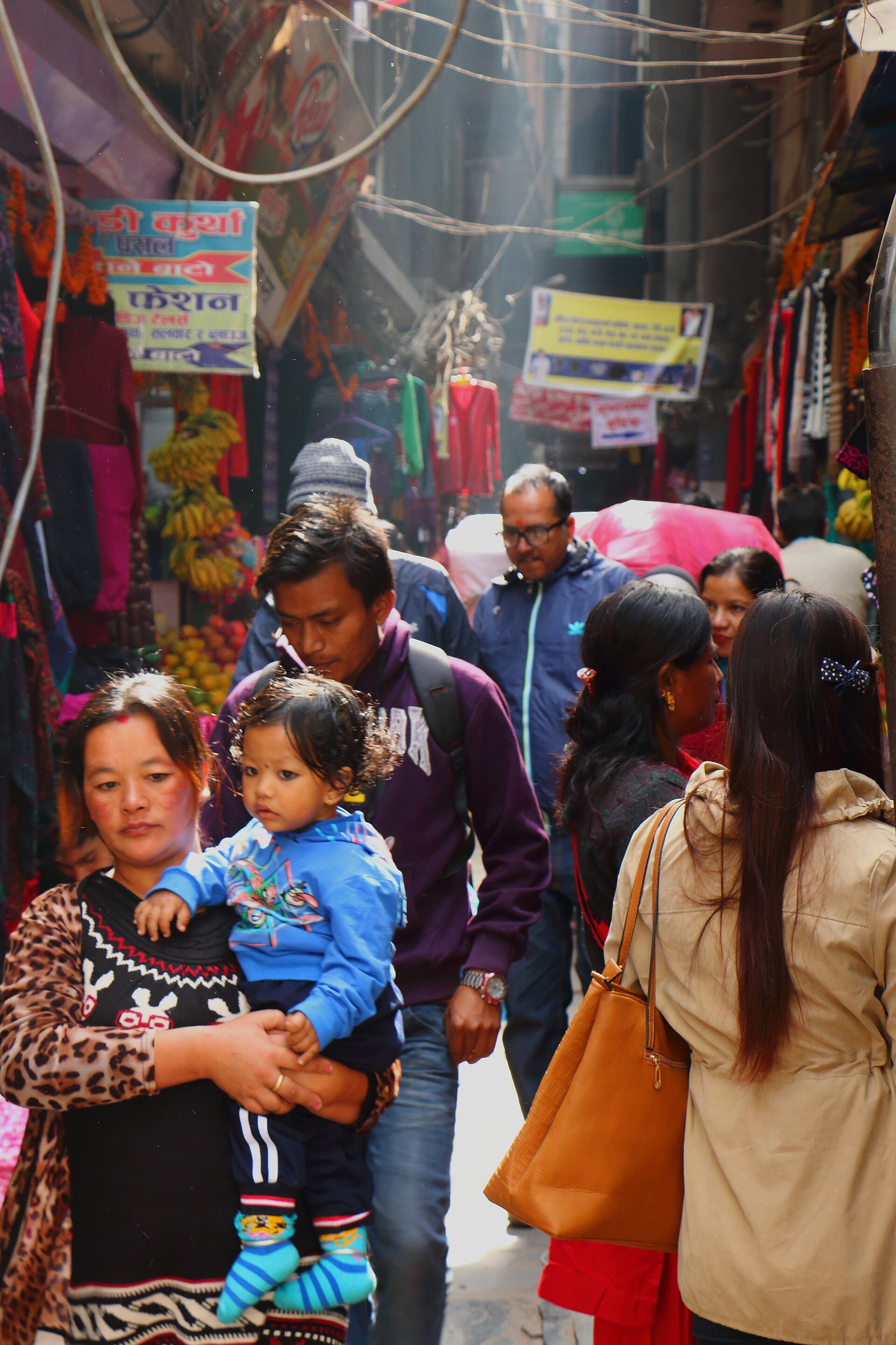 A family at a market in Kathmandu