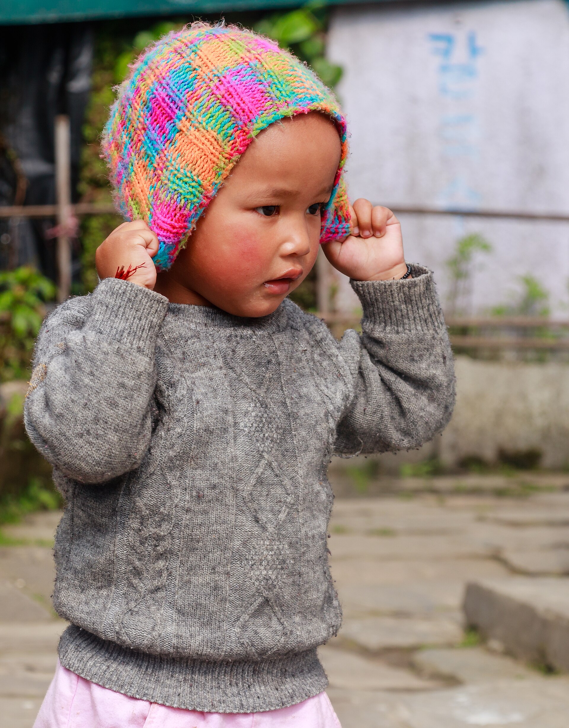 A young child photographed in soft daylight