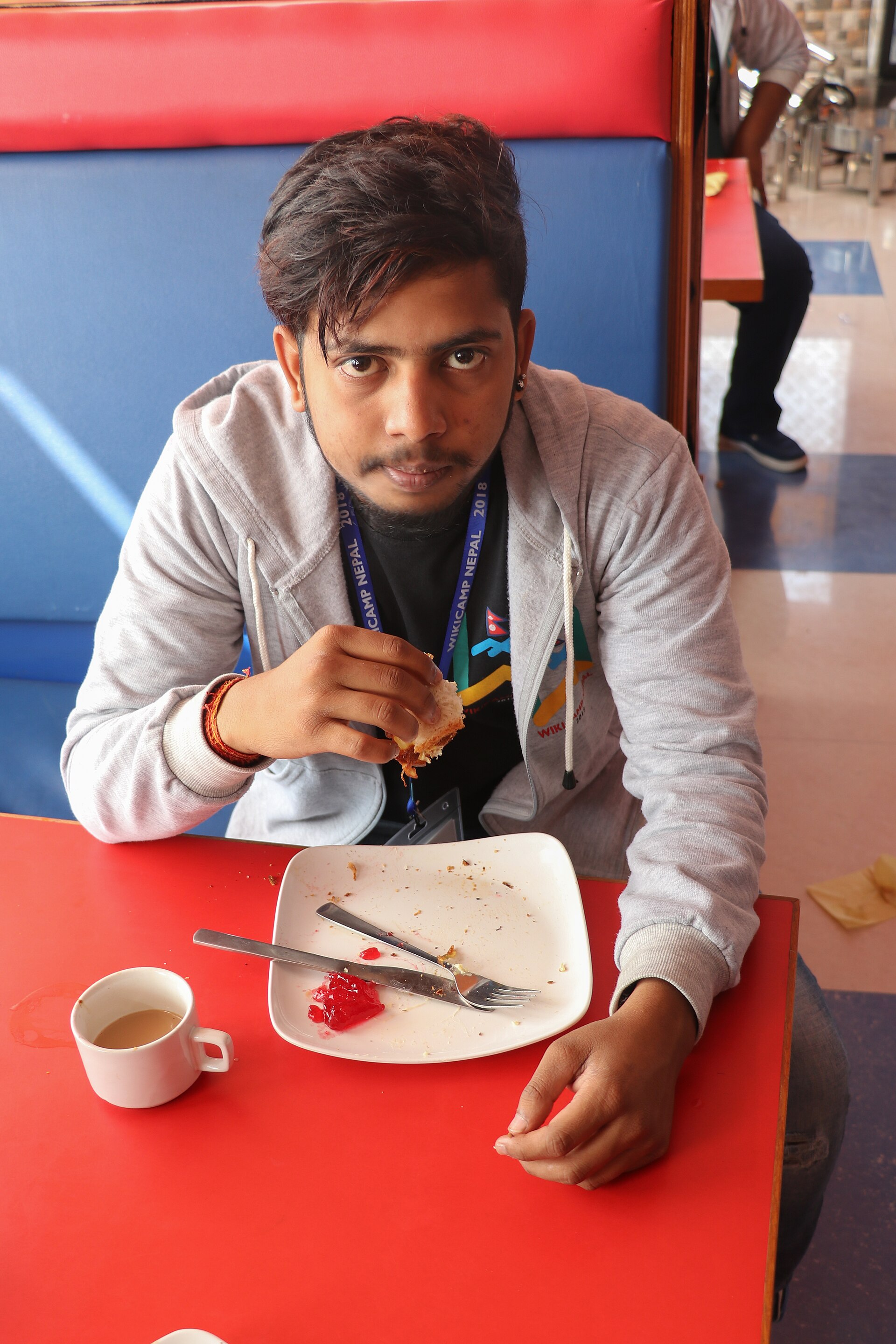 A volunteer taking notes during a workshop
